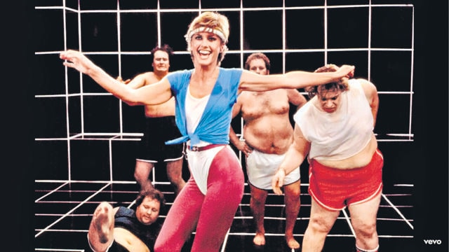 A still from her music video Physical, in which she sported the iconic white leotard look A still from her music video Physical, in which she sported the iconic white leotard look