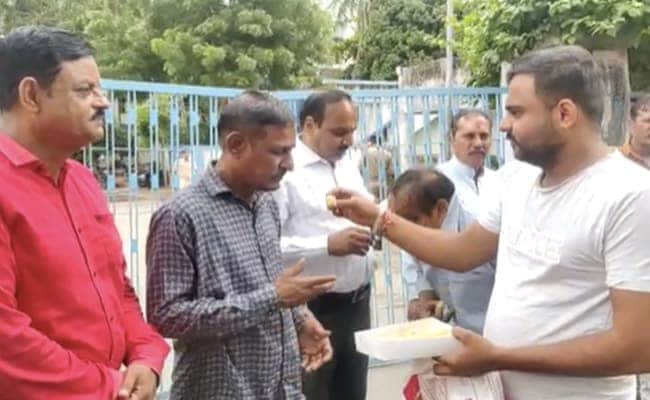 Questions about whether the remission was done with an eye on the Gujarat polls are only natural — especially in the context of the welcome the convicts received on their release.&nbsp; (Source: Twitter)
