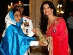 Aishwarya Rai receives the Padma Shri from the then President of India, Pratibha Patil, in 2009.
