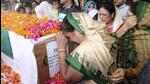 The last rites of Lance Naik Chandrashekhar Harbola were performed with full military honours at Haldwani, in Nainital district, on Wednesday. (AP) The last rites of Lance Naik Chandrashekhar Harbola were performed with full military honours at Haldwani, in Nainital district, on Wednesday. (AP)