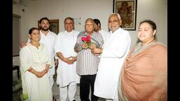 Bihar chief minister Nitish Kumar with RJD chief Lalu Prasad in Patna on Wednesday. (Santosh Kumar/HT Photo)