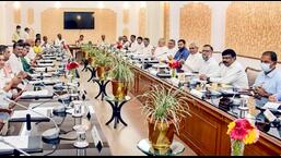 Bihar chief minister Nitish Kumar with deputy chief minister Tejashwi Yadav and cabinet ministers at a meeting at Old Secretariat in Patna on Tuesday. (PTI)