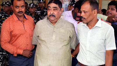 Trinamool Congress leader Anubrata Mondal (centre) being taken by CBI officials in Kolkata. (ANI Photo) Trinamool Congress leader Anubrata Mondal (centre) being taken by CBI officials in Kolkata. (ANI Photo)