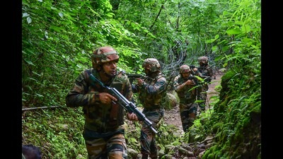 Indian army soldiers patrol near the Line of Control in Poonch district, Jammu and Kashmir. (PTI) Indian army soldiers patrol near the Line of Control in Poonch district, Jammu and Kashmir. (PTI)
