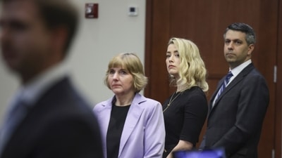 A picture of Amber Heard with her former lawyer Elaine Bredehoft during her defamation case trial against Johnny Depp. (AP) A picture of Amber Heard with her former lawyer Elaine Bredehoft during her defamation case trial against Johnny Depp. (AP)