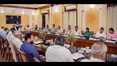 Bihar chief minister Nitish Kumar along with new cabinet ministers during a meeting at the Old Secretariat in Patna. (PTI) Bihar chief minister Nitish Kumar along with new cabinet ministers during a meeting at the Old Secretariat in Patna. (PTI)