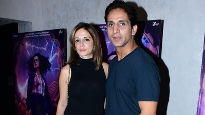 Interior designer and entrepreneur Sussanne Khan and boyfriend Arslan Goni attended the special screening of Taapsee Pannu's upcoming film Dobaaraa in Mumbai on Tuesday. The two were twinning in blue denims at the event. (Varinder Chawla) 