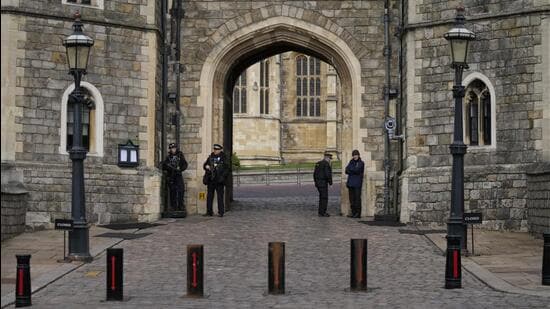 Police guard the Henry VIII gate to Windsor Castle in Windsor, England, Wednesday. Jaswant Singh Chail, 20, has been charged under the Treason Act after allegedly being caught with a crossbow on the palace grounds. (AP Photo/Alastair Grant, File) (AP)