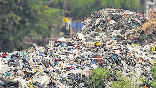 New Delhi, July 01 (ANI): A heap of garbage and plastic bags seen in the open drain at Taimoor Nagar in view of ban on single-use plastic, in New Delhi on Friday. (ANI Photo) (Ishant Kumar)