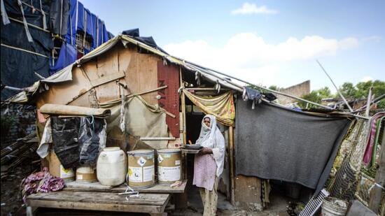 New Delhi: 37-year-old Tasleema poses for photographs at the Rohinya refugee settlement area in Kalindi Kunj, New Delhi, Wednesday, Aug. 17, 2022. The MHA made it clear that it has not given any direction to provide EWS flats to Rohingya Muslims in Delhi. (PTI)