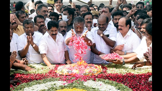 O Panneerselvam and his supporters pay tribute at the memorial of former Tamil Nadu chief minister J Jayalalithaa in Chennai on Wednesday. (ANI)