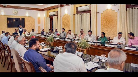 Bihar chief minister Nitish Kumar along with new cabinet ministers during a meeting at the Old Secretariat in Patna. (PTI)