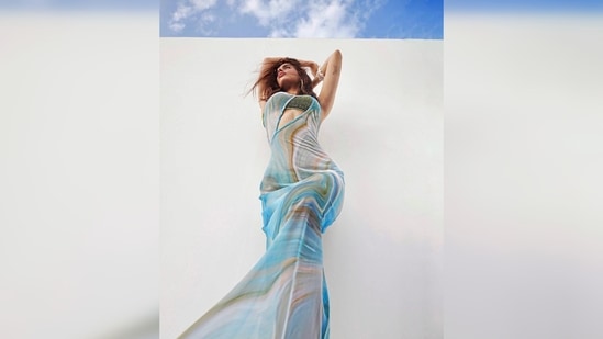 Khushi Kapoor's swimsuit is from an international resort wear label Oséree, based in Milan, Italy and her dress is from Jaden London.(Instagram/@chandiniw)