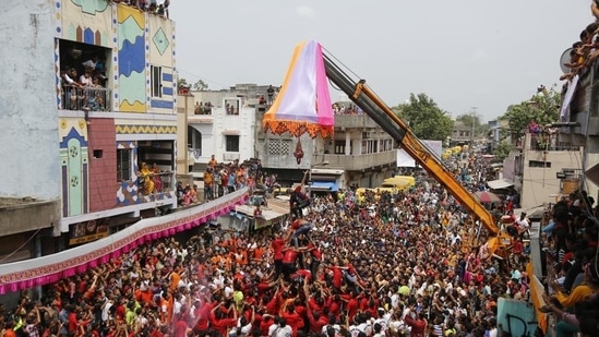 Dahi Handi, also called Gopal Kala or Dahikala, is an event which usually takes place on the second day of Janmashtami. To this day, people mimic Lord Krishna's winsome moments as a child. An earthen pot filled with butter/dahi is hung from a great height and a group of people make a human pyramid and break the pot.(Representative Image/AP Photo)