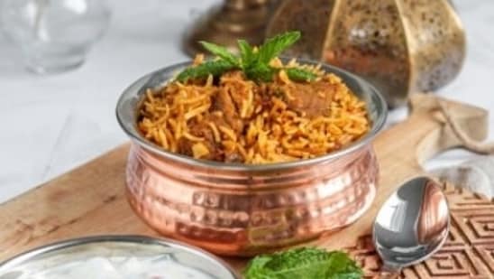 Biriyani is one such another lunch time trap – easily available and tasty, Biriyani makes us fall asleep faster. It should be avoided for lunch.(Unsplash)