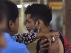 A person being inoculated with a booster dose of Covid-19 vaccine at district hospital in Sector 30, Noida, India, on Thursday, August 18, 2022. (Photo by Sunil Ghosh / Hindustan Times)