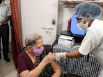 An elderly woman getting vaccinated against Covid. (HT Image) An elderly woman getting vaccinated against Covid. (HT Image)
