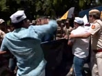Aam Aadmi Party (AAP) workers protesting outside Congress HQ over Jalore (Rajasthan) incident, wherein a 9-year-old Dalit student was beaten to death by his teacher, being detained by Police.