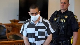 Hadi Matar, 24, center, arrives for an arraignment in the Chautauqua County Courthouse in Mayville, N.Y., Saturday, Aug. 13, 2022. Matar, is accused of carrying out a stabbing attack against “Satanic Verses” author Salman Rushdie.