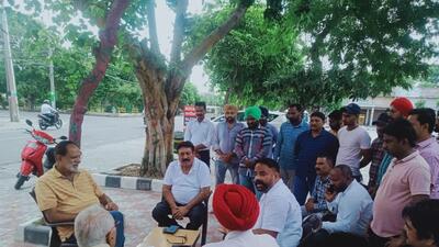 Members of MC employees’ union during a meeting regarding regularisation of 394 staffers with mayor Balkar Sandhu in Ludhiana. (HT PHOTO)