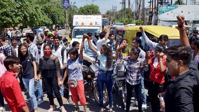 Students protest cancellation of CUET (Common University Entrance Test) at a centre in Noida Sector 64 on Friday. (ANI) Students protest cancellation of CUET (Common University Entrance Test) at a centre in Noida Sector 64 on Friday. (ANI)