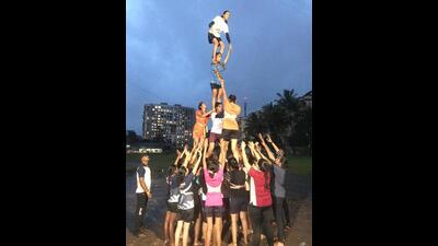 Yuva Rashtra Kabaddi Academy group of women Govindas from Kalyan Dombivli practicing for Dahi Handi festival on Wednesday. Various groups in Kalyan-Dombivli and Thane are conducting fitness tests for the Govindas ahead of the festival. (PRAMOD TAMBE/HT PHOTO)