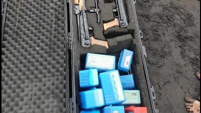 The police reportedly found an unidentified boat with three AK-47 rifles and bullets at Harihareshwar Beach and a lifeboat at Bharadkhol, in Raigad district. (HT Photo) The police reportedly found an unidentified boat with three AK-47 rifles and bullets at Harihareshwar Beach and a lifeboat at Bharadkhol, in Raigad district. (HT Photo)