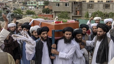 Mourners carry the body of a victim of a mosque bombing in Kabul, Afghanistan, on Thursday, August 18. 2022. (AP) Mourners carry the body of a victim of a mosque bombing in Kabul, Afghanistan, on Thursday, August 18. 2022. (AP)
