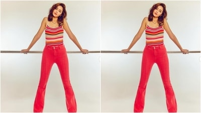 Ananya decked up in a multicoloured tank top and teamed it with a pair of high waisted red corduroy trousers. (Instagram/@ananyapanday)
