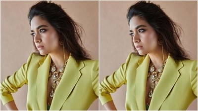 Keerthy paired a lemon-yellow blazer with lapel collars and pockets at the sides with a pair of lemon-yellow trousers as she posed like a diva. (Instagram/@keerthysureshofficial)