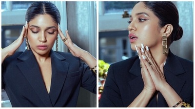 Bhumi Pednekar is currently busking on the success of her recent release Raksha Bandhan which also stars Akshay Kumar. The actor once again took the fashion game a notch higher as she exudes elegance in a black pantsuit. (Instagram/@bhumipednekar) Bhumi Pednekar is currently busking on the success of her recent release Raksha Bandhan which also stars Akshay Kumar. The actor once again took the fashion game a notch higher as she exudes elegance in a black pantsuit. (Instagram/@bhumipednekar)