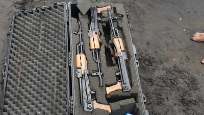 Case filled with 3 assault rifle and live bullets found off Maharashtra coast Case filled with 3 assault rifle and live bullets found off Maharashtra coast