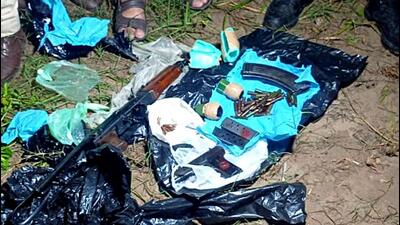 Arms and ammunition dropped by a Pakistani drone recovered at Toph village near the International border. (ANI) Arms and ammunition dropped by a Pakistani drone recovered at Toph village near the International border. (ANI)