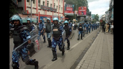 Rapid Action Force (RAF) and city police route march on Tilak road ahead of Dahi Handi celebrations on Thursday. (HT PHOTO) Rapid Action Force (RAF) and city police route march on Tilak road ahead of Dahi Handi celebrations on Thursday. (HT PHOTO)