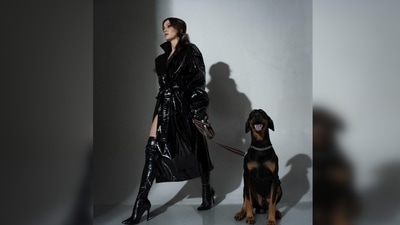 Sharing another set of pictures with the Doberman and a coffee in her hand, Elli AvrRam wrote, "New York City Vibes in my mind. ‘Don’t forget your coffee’". (Instagram/@elliavrram)