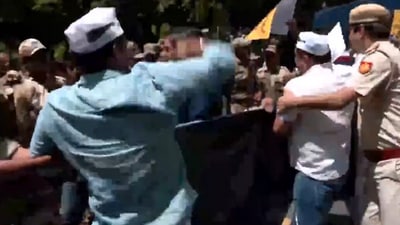 Aam Aadmi Party (AAP) workers protesting outside Congress HQ over Jalore (Rajasthan) incident, wherein a 9-year-old Dalit student was beaten to death by his teacher, being detained by Police. Aam Aadmi Party (AAP) workers protesting outside Congress HQ over Jalore (Rajasthan) incident, wherein a 9-year-old Dalit student was beaten to death by his teacher, being detained by Police.