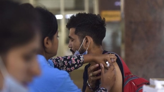 A person being inoculated with a booster dose of Covid-19 vaccine at district hospital in Sector 30, Noida, India, on Thursday, August 18, 2022. (Photo by Sunil Ghosh / Hindustan Times)