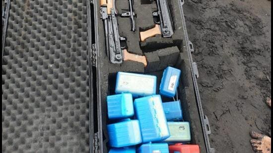 The police reportedly found an unidentified boat with three AK-47 rifles and bullets at Harihareshwar Beach and a lifeboat at Bharadkhol, in Raigad district. (HT Photo) The police reportedly found an unidentified boat with three AK-47 rifles and bullets at Harihareshwar Beach and a lifeboat at Bharadkhol, in Raigad district. (HT Photo)