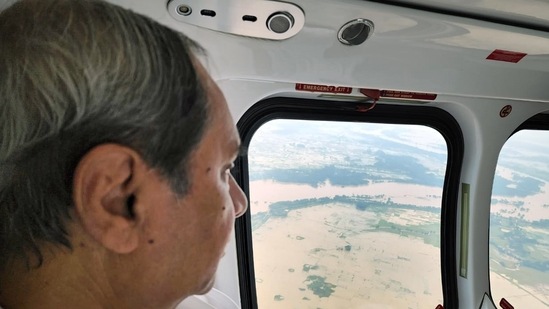  Odisha Chief Minister Naveen Patnaik conducts an aerial survey of the flood-affected areas of Khurdha, Puri, Cuttack, Jagatsinghpur and Kendrapara districts, on Thursday. (ANI Photo) Odisha Chief Minister Naveen Patnaik conducts an aerial survey of the flood-affected areas of Khurdha, Puri, Cuttack, Jagatsinghpur and Kendrapara districts, on Thursday. (ANI Photo)