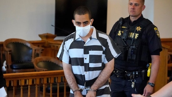 Hadi Matar, 24, center, arrives for an arraignment in the Chautauqua County Courthouse in Mayville, N.Y., Saturday, Aug. 13, 2022. Matar, is accused of carrying out a stabbing attack against “Satanic Verses” author Salman Rushdie.(AP)