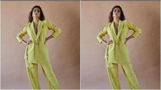 Keerthy decked up as the boss lady and looked like a billion bucks in a lemon-yellow pantsuit as she slayed office fashion goals for us.(Instagram/@keerthysureshofficial)