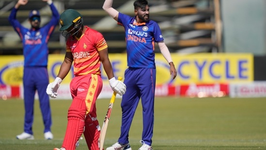 Indian cricket players celebrate a wicket on the first day of the One-Day International cricket match between Zimbabwe and India(AP)