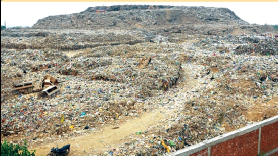 Of this, 5 lakh MT from before 2005 is being bio-mined under a Smart City project. Initially planned to completed by May 2021, the project now has an August 2023 deadline, though officials say it is likely to be achieved by December 2022. (HT PHOTO )
