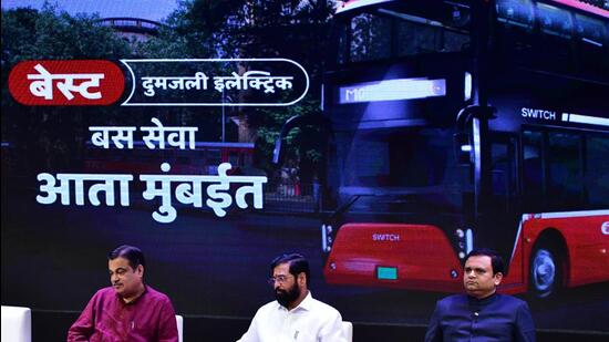 Mumbai, India - August 18, 2022: Union Minister for Road Transport & Highways Nitin Gadkari and Maharashtra CM Eknath Shinde during the unveiling of India's first BEST Double Decker AC electric bus, at NCPA, in Mumbai, India, on Thursday, August 18, 2022. (Photo by Bhushan Koyande/HT Photo) (HT PHOTO)