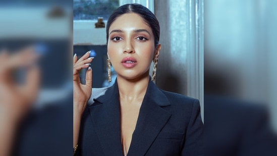 Bhumi Pednekar amped up her look by teaming her pantsuit with jewellery from the luxury label Versace.(Instagram/@bhumipednekar)