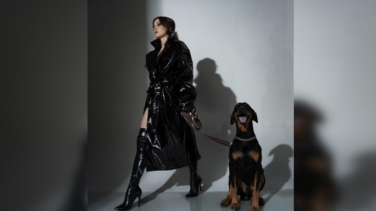 Sharing another set of pictures with the Doberman and a coffee in her hand, Elli AvrRam wrote, "New York City Vibes in my mind. ‘Don’t forget your coffee’".(Instagram/@elliavrram)