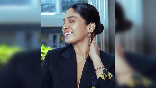 Bhumi Pednekar closed her eyes and smiled, giving the perfect candid pose for the camera.(Instagram/@bhumipednekar)