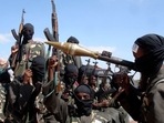 FILE - Armed al-Shabab fighters ride on pickup trucks as they prepare to travel into the city, just outside the capital Mogadishu, Somalia, Dec. 8, 2008.. (AP Photo/Farah Abdi Warsameh, File)