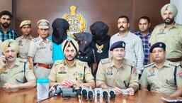 Ropar Range DIG Gurpreet Singh Bhullar addressing the media regarding the rescue and arrests in Mohali on Friday.  (HT Photo)