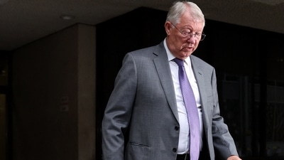 Former Manchester United manager Alex Ferguson leaves Manchester Crown Court&nbsp; (REUTERS)
